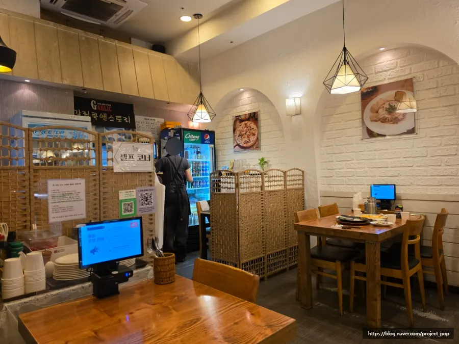 Tables and interior atmosphere at Garlic Cook & Story