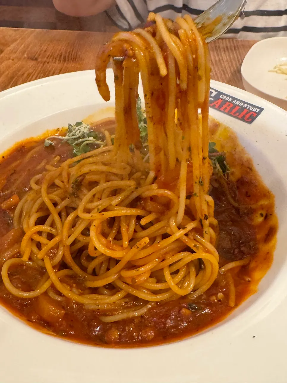Close-up of Garlic Cook & Story's tomato pasta