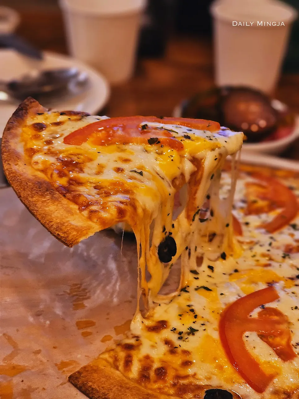 A plate with margherita pizza and pasta together