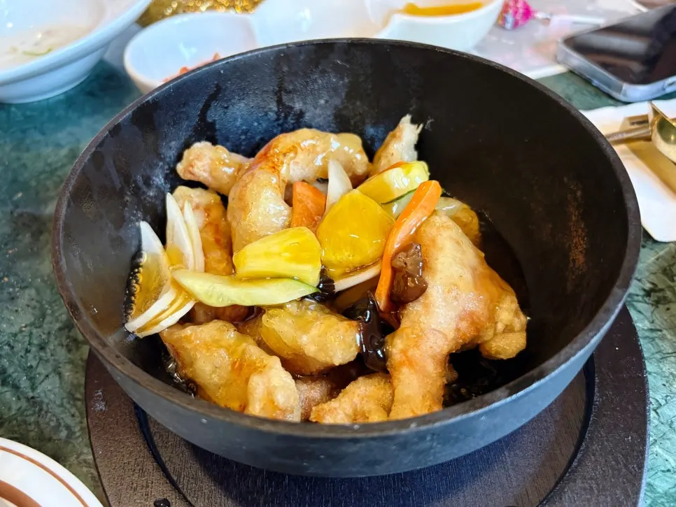 Tokyo tangsuyuk served sauce-poured style in a ceramic bowl