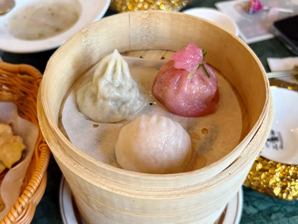 A plate of the 3-piece handmade dim sum sampler