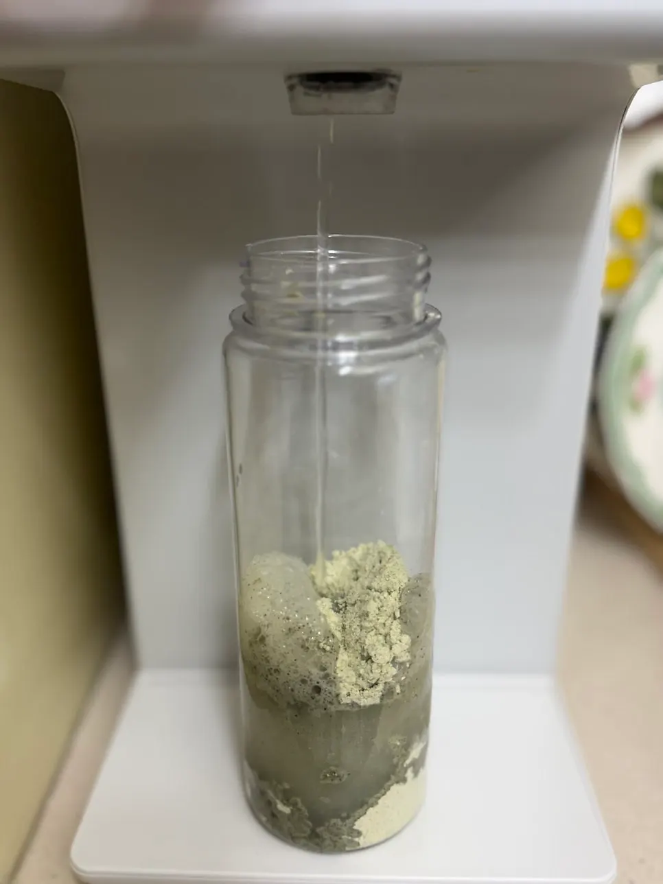 A glass of yakkong soy milk mixed to the desired strength
