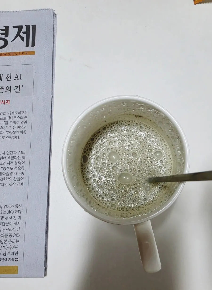 Black bean breakfast drink stirred together with milk