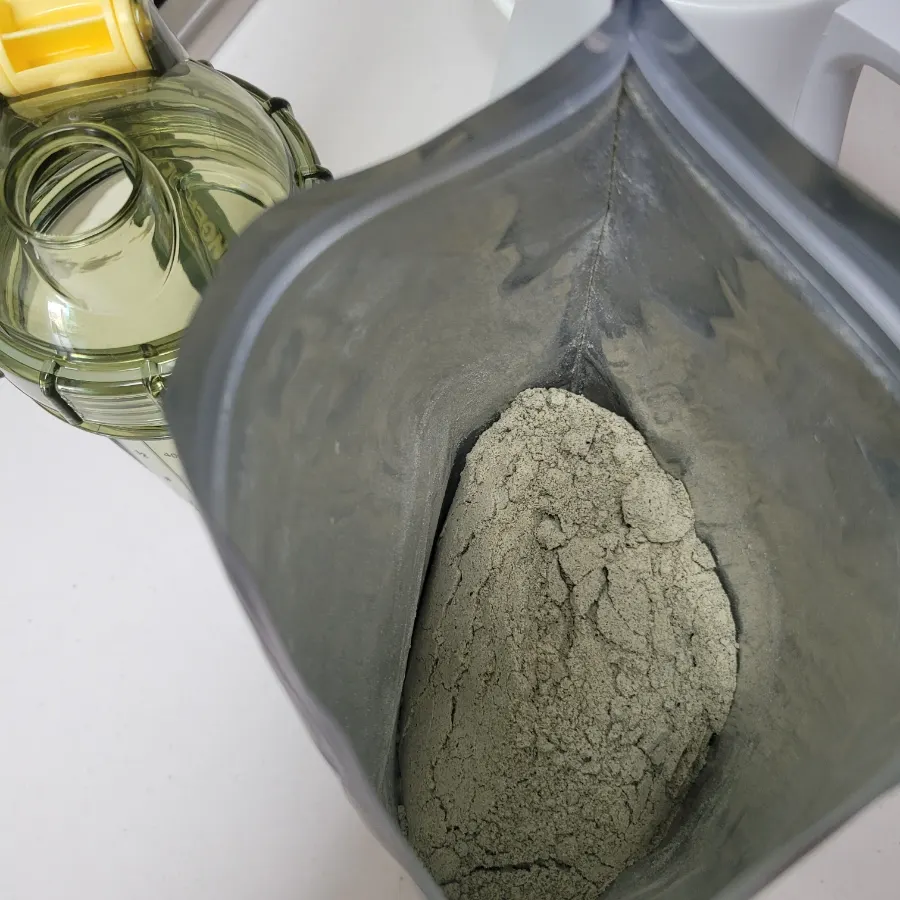 The grain powder's color, which isn't actually black
