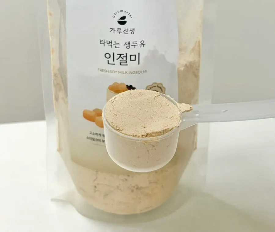 Close-up of the finely ground injeolmi-flavored soy milk powder particles