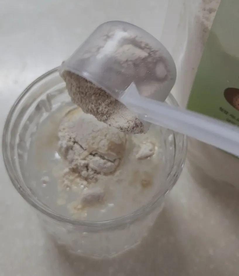 Oat drink powder added to water