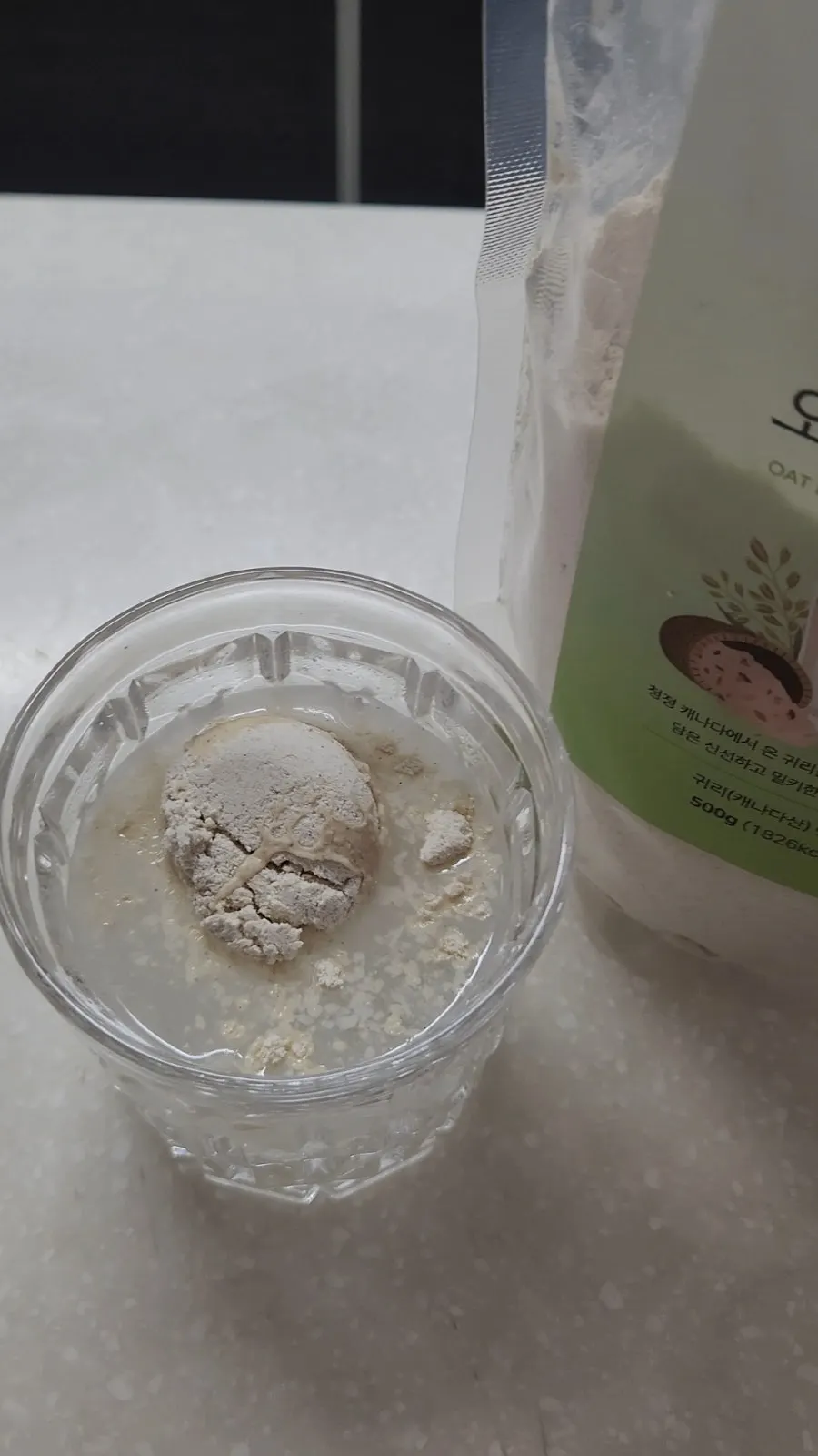 Oat drink mixed with water