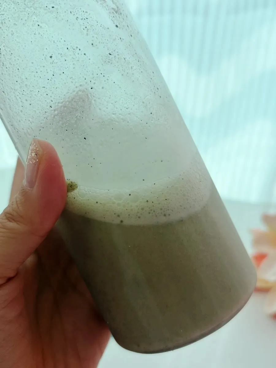 A finished glass of yakkong soy milk mixed with a shaker