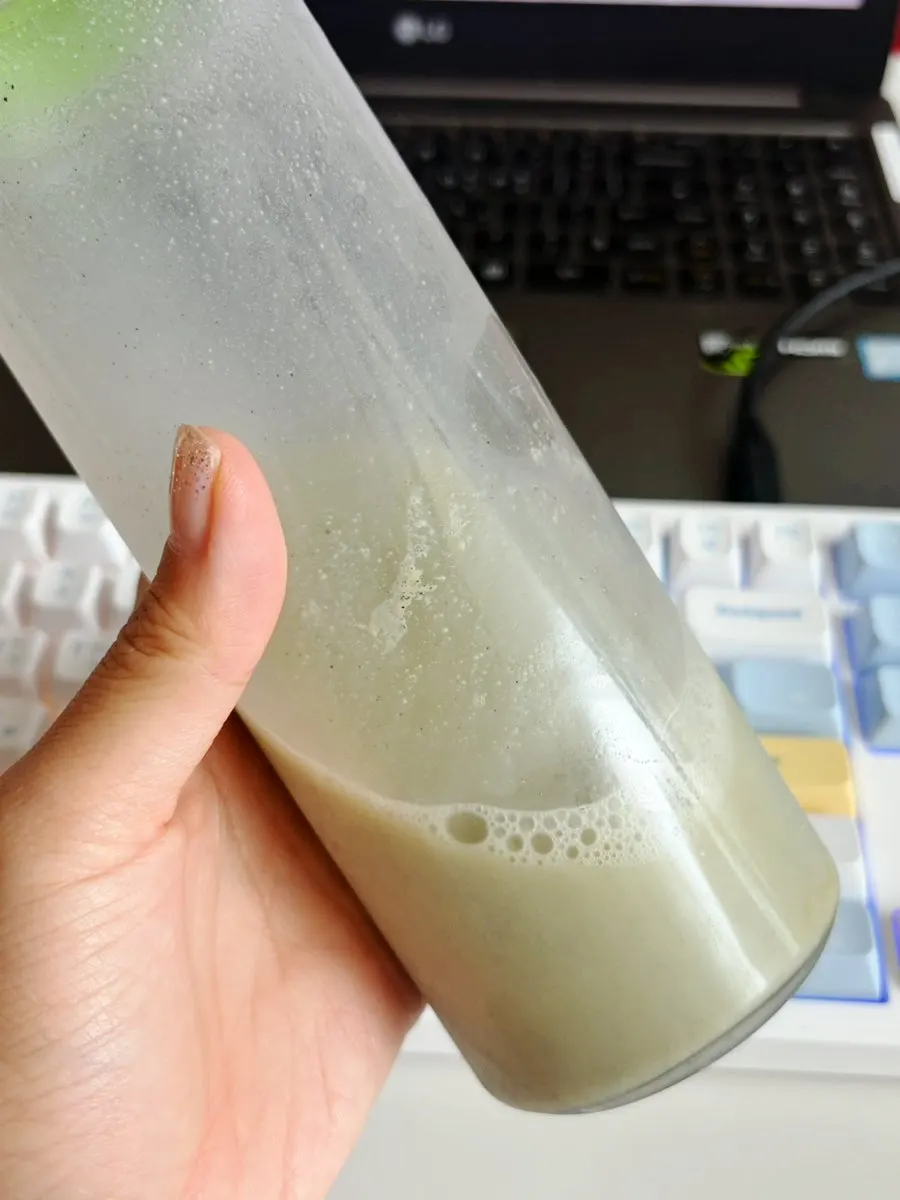 A glass of yakkong soy milk with a natural nutty bean flavor