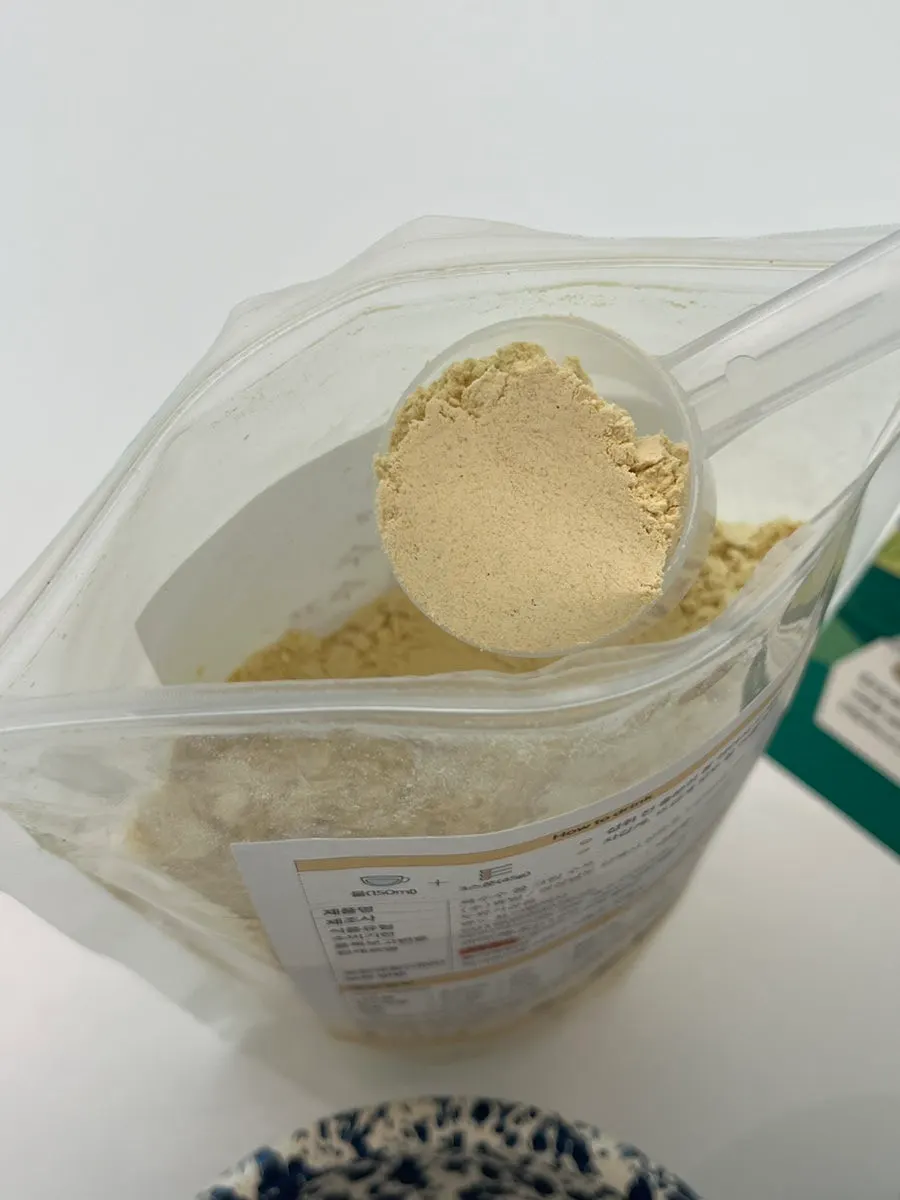 Corn soup powder scooped from an opened zip bag