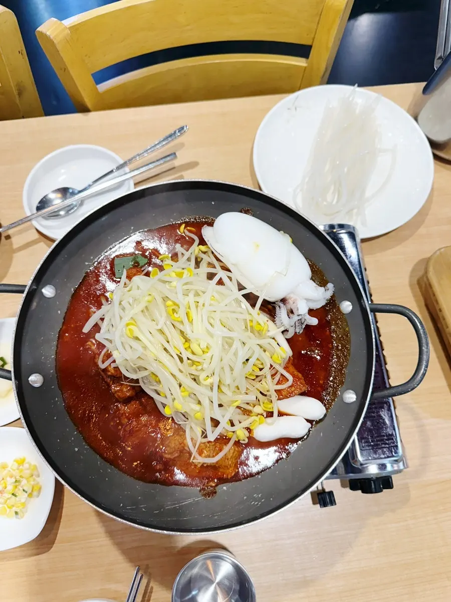 Cuttlefish braised short ribs ordered at 'deliciously spicy' heat