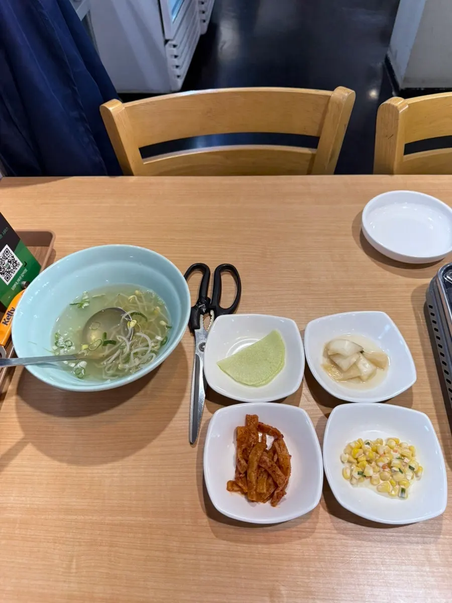 Clear soybean sprout soup served with the braised ribs