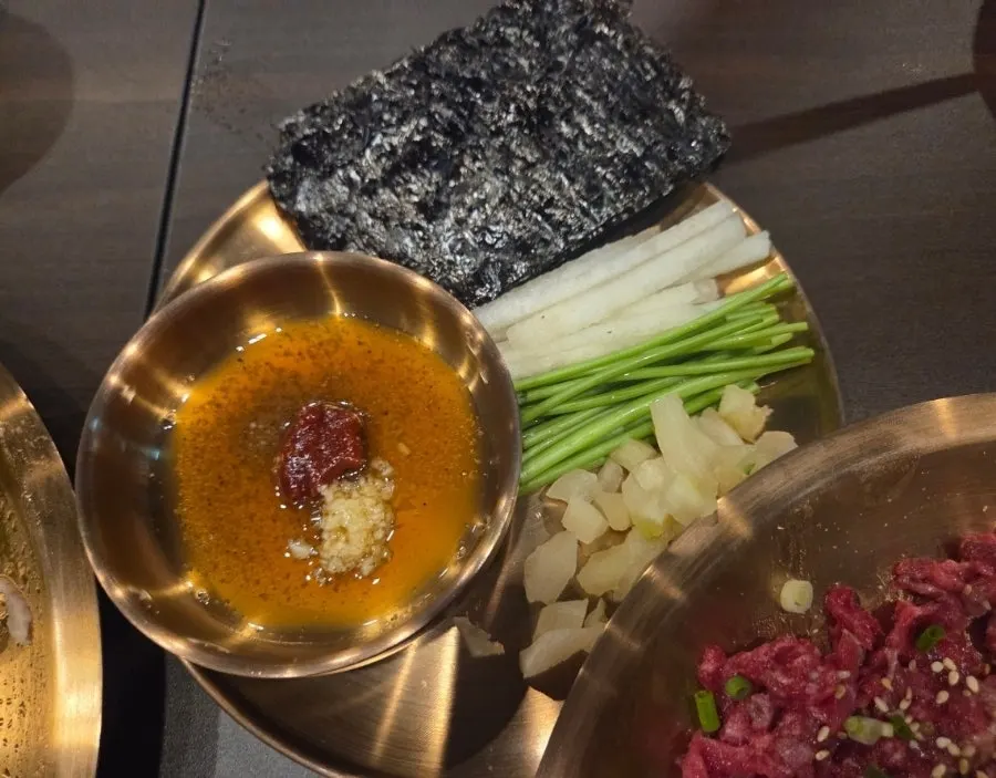 Evening table setting with suyuk and soju