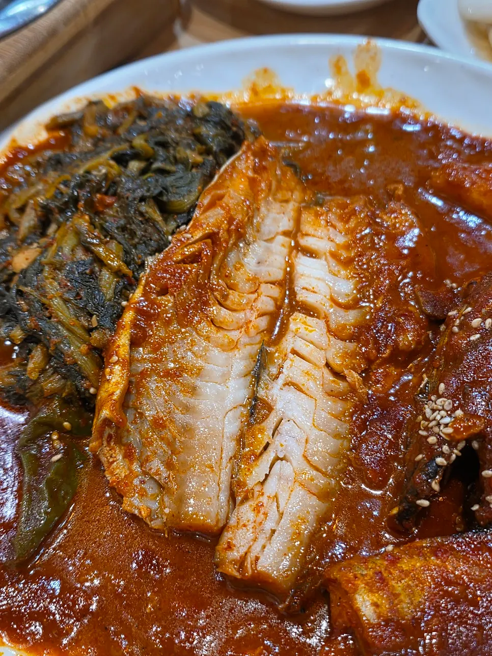 Close-up of braised pollock soaked in spicy-sweet sauce