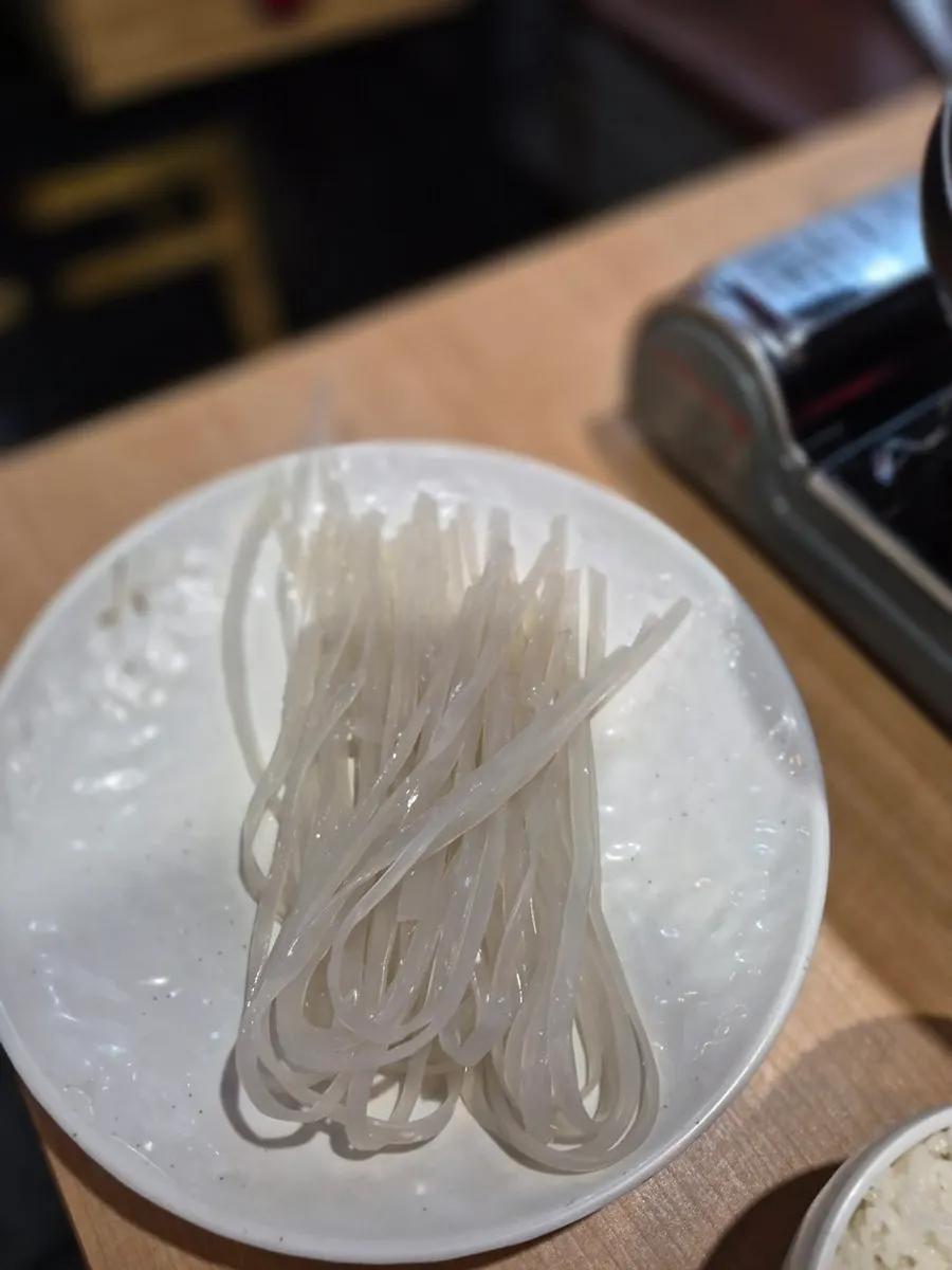Chewy rice cake and large rib pieces scooped up