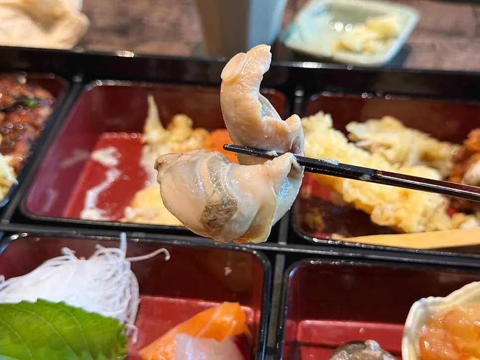 A chewy piece of seafood side dish