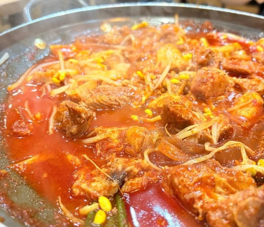 Spicy braised short ribs with a sweet and spicy-tangy sauce