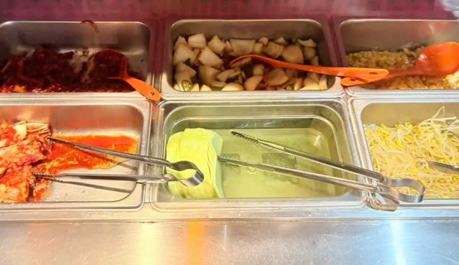 Corn salad refilled from the self-serve bar