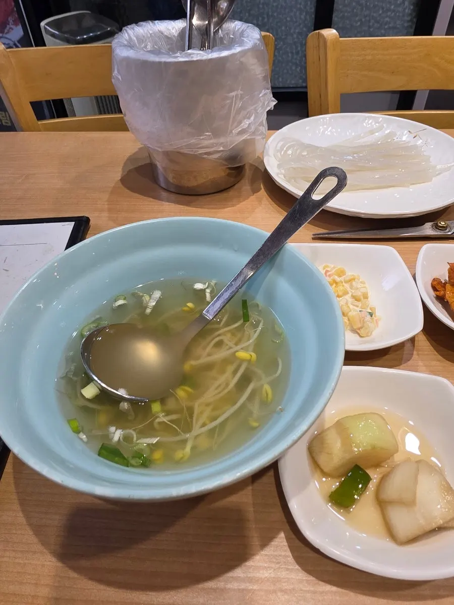 Table setting of basic side dishes served with the spicy braised ribs