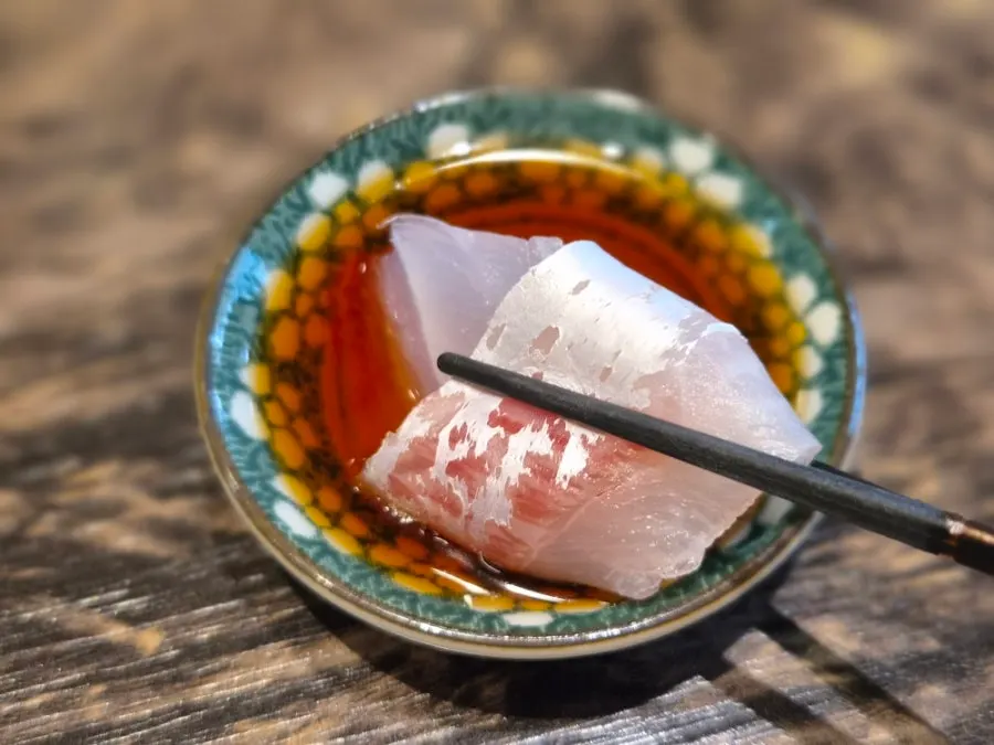 Chicken porridge and aged sashimi course