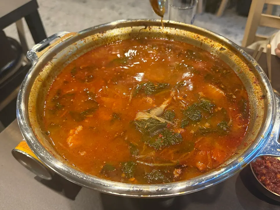 Gopchang hot pot broth eaten with a bowl of rice