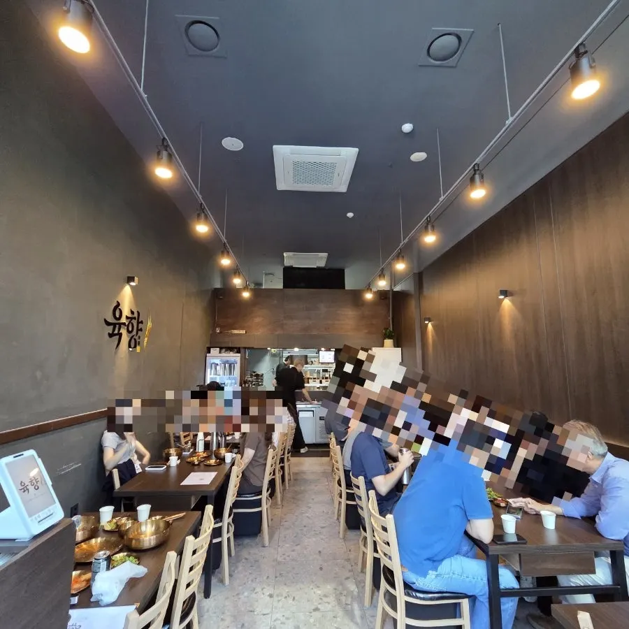 Window seats at Yukhwang with lunchtime customers