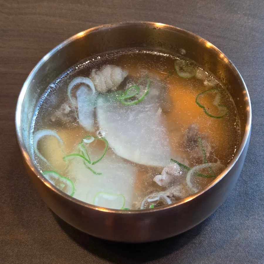 Nakji jeotgal spooned over yukhoe bibimbap