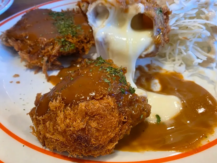 Cross-section of the cut cheese tonkatsu