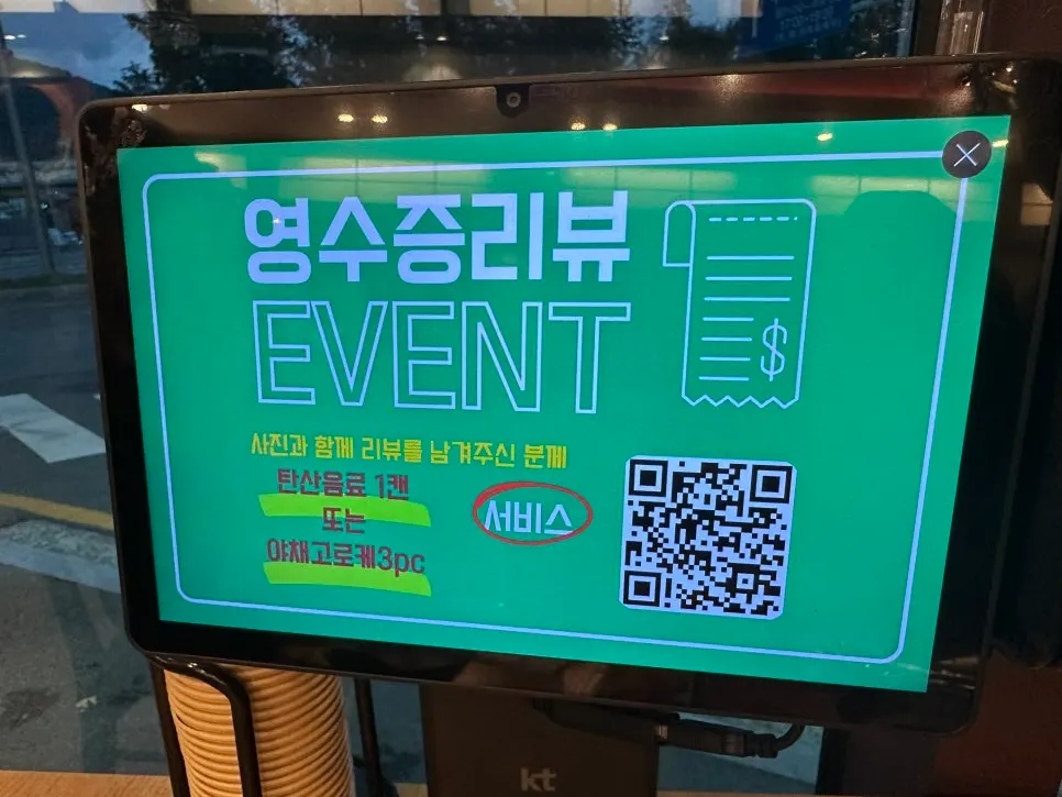 Signage and seating inside the restaurant