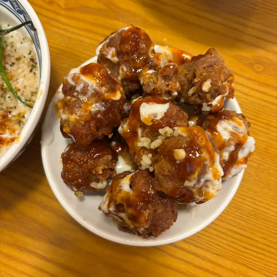 Crispy karaage moved onto an empty plate