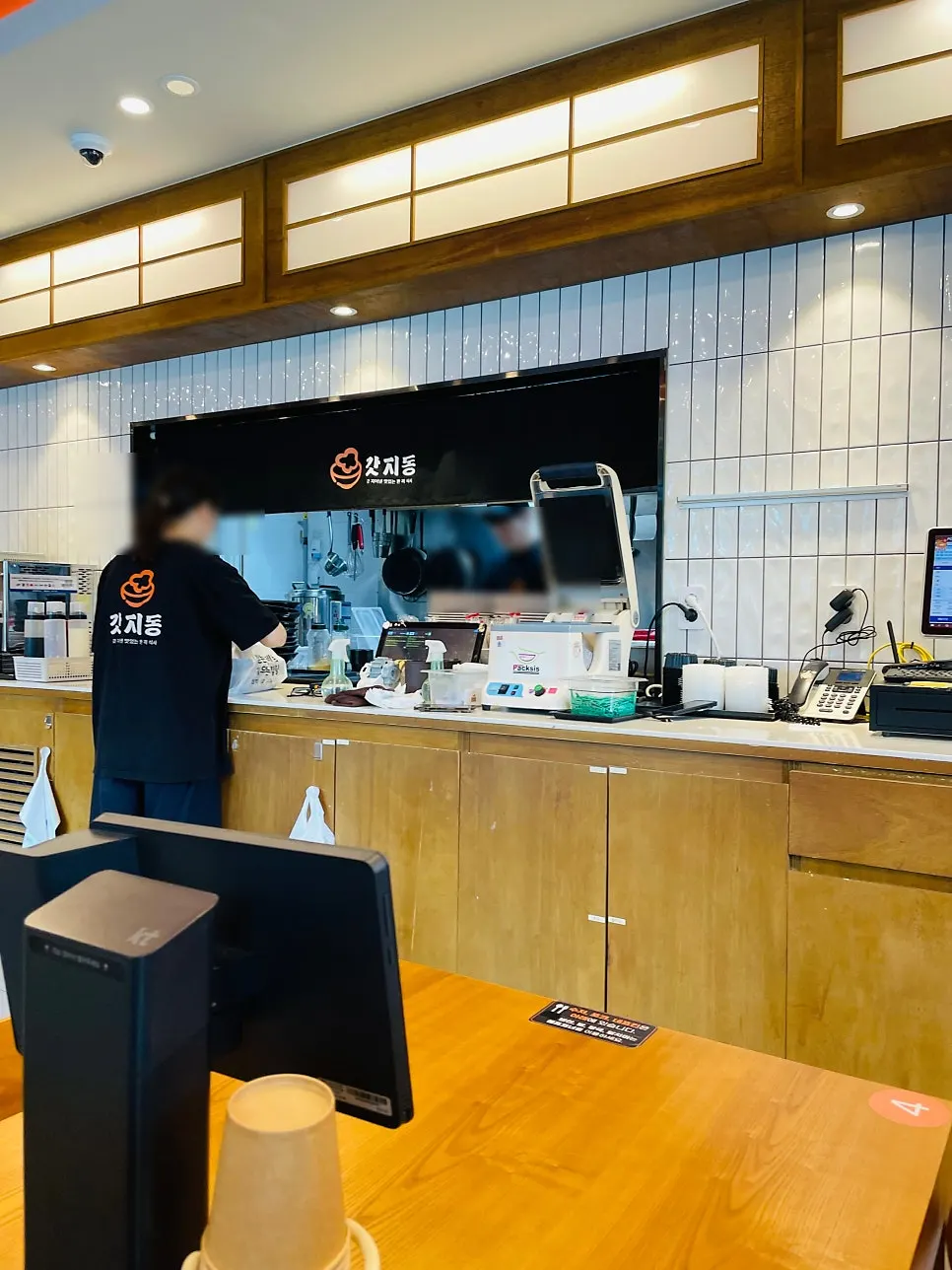 Interior with bar seating and 2- and 4-person tables