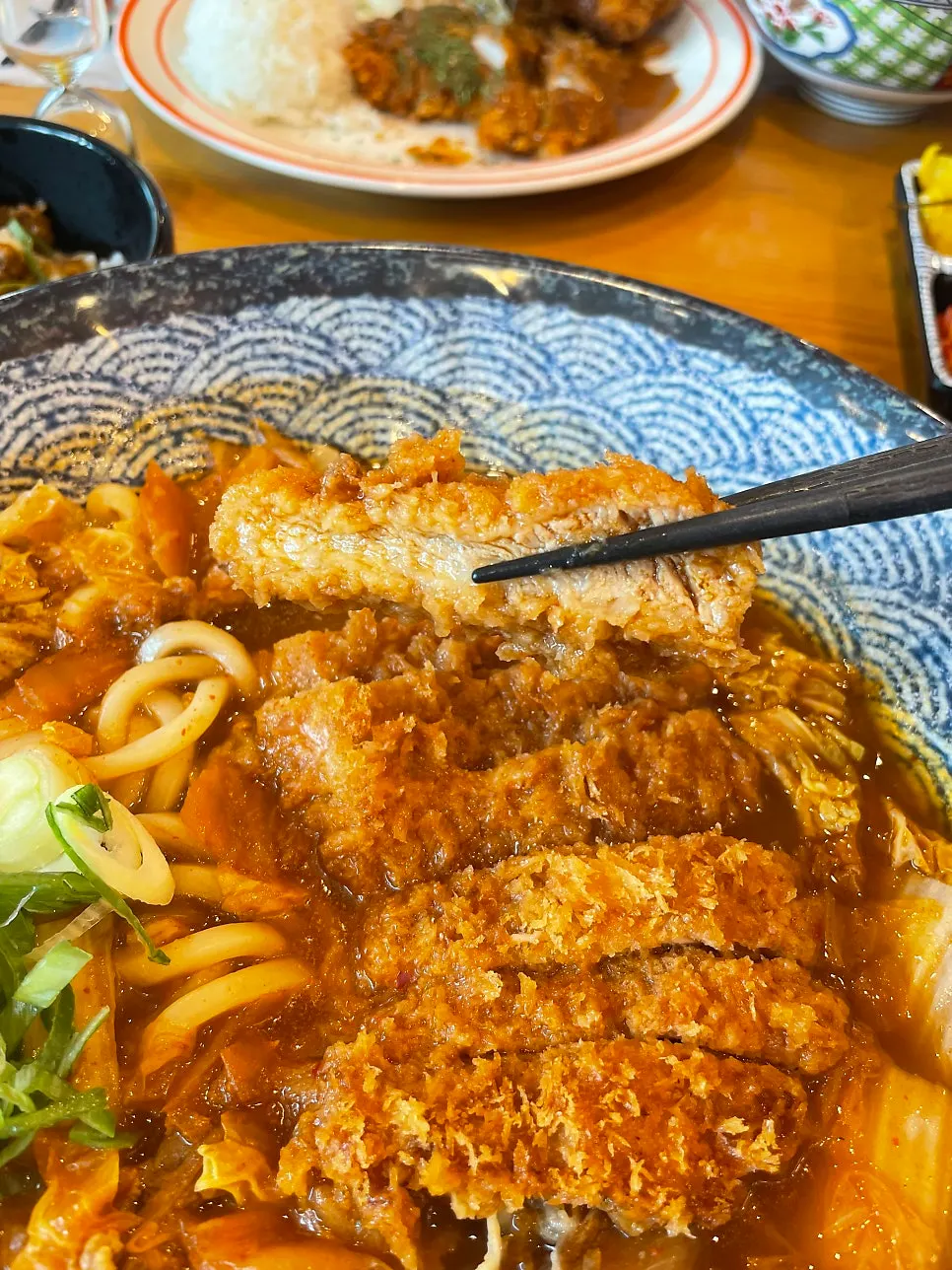 Udon noodles, kimchi and beef brisket packed in the kimchi nabe