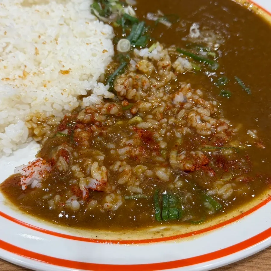 Rice mixed thickly with curry