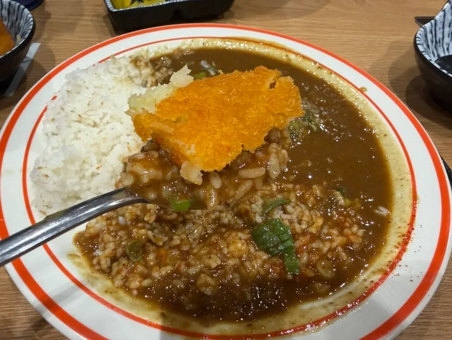 Kimchi served alongside the curry rice