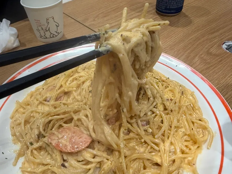 A plate of spicy pepperoni cream pasta