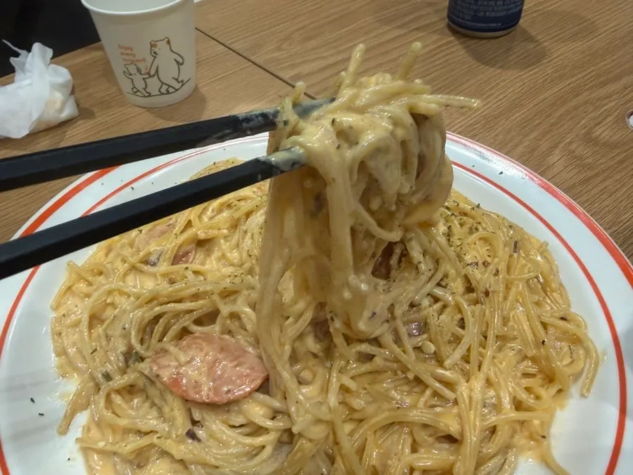 Pepperoni packed throughout the noodles