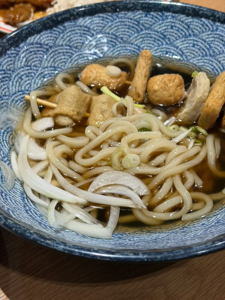 A bowl of Gatjidong's fish cake skewer udon