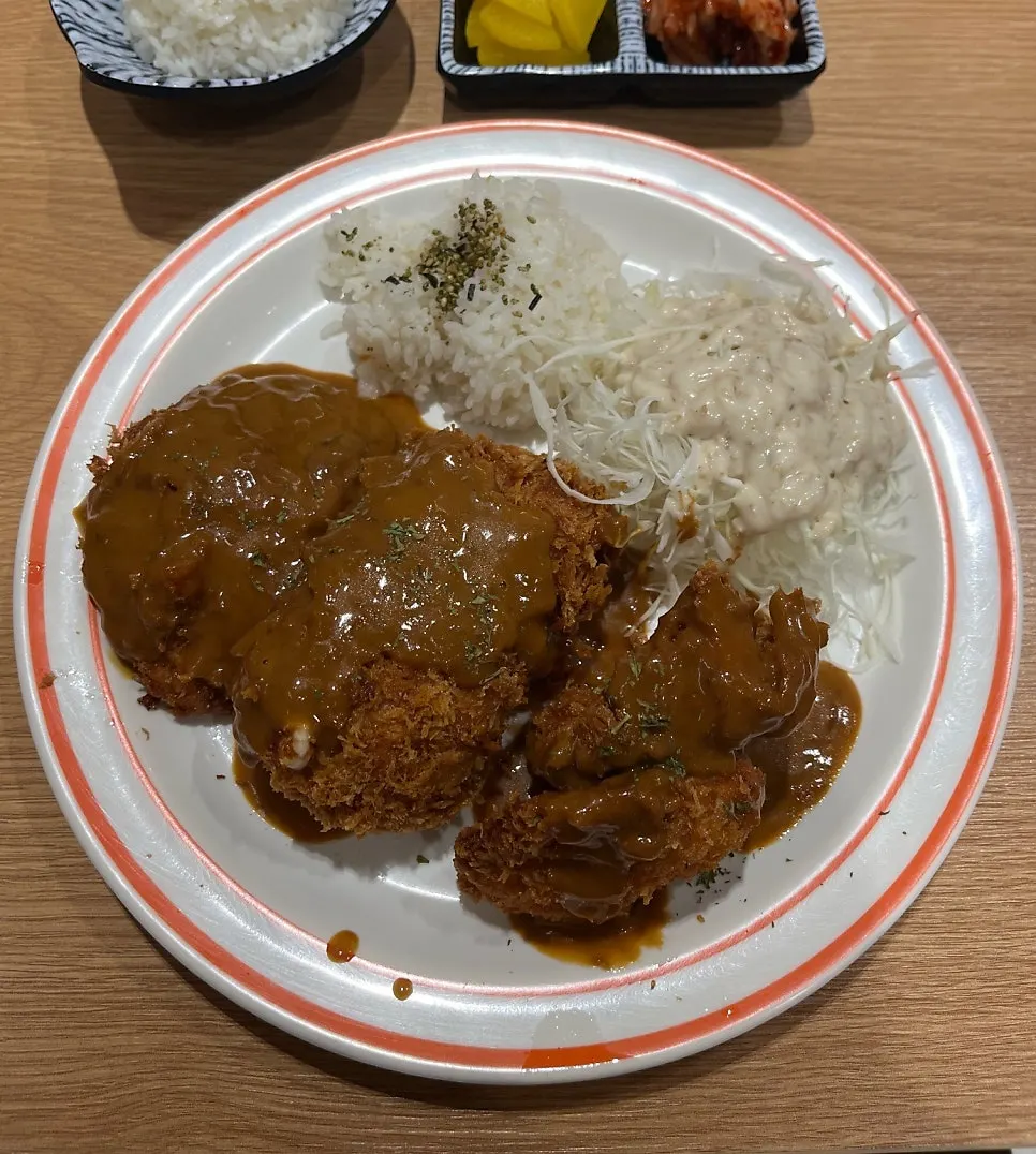 Table set with the mixed platter, rice, and side dishes
