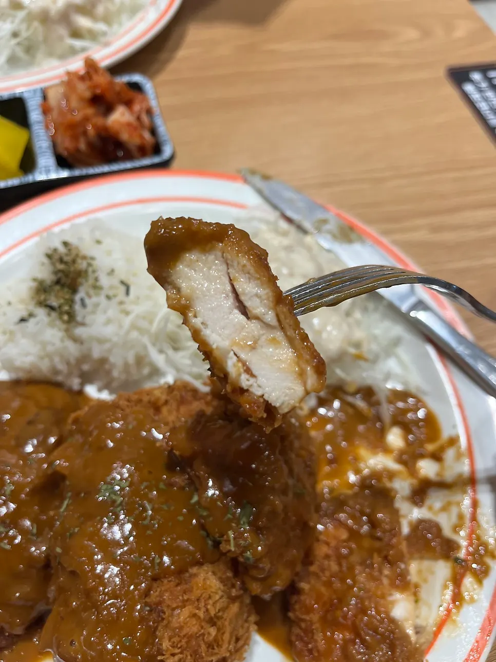 Piece of crispy-battered chicken katsu