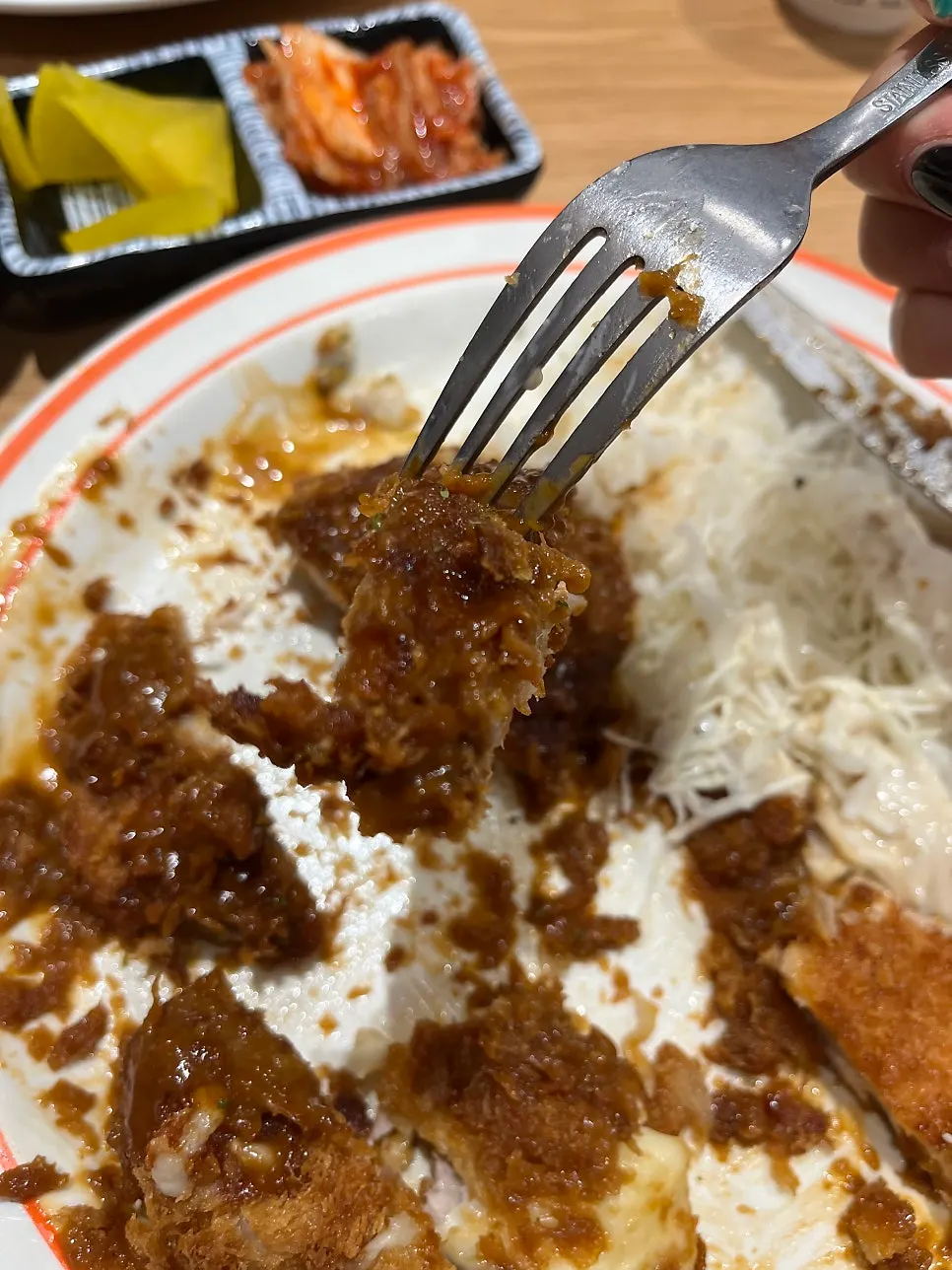 Old-style breaded cutlet topped with sauce