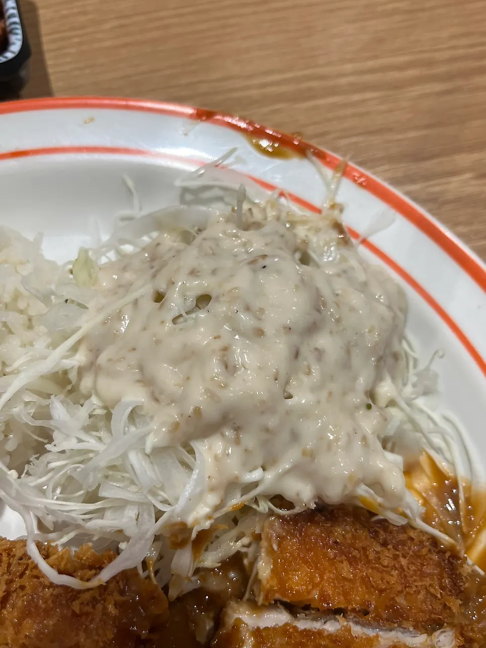 Salad served alongside the old-style breaded cutlet