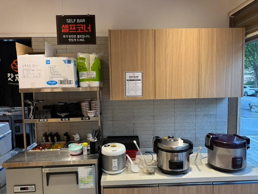 Self-serve corner with broth soup and cream soup