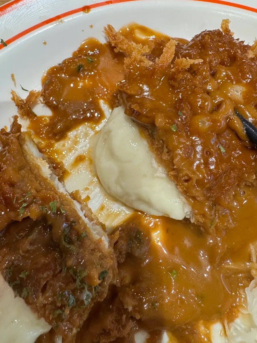 Whole mozzarella cheese pork cutlet served uncut