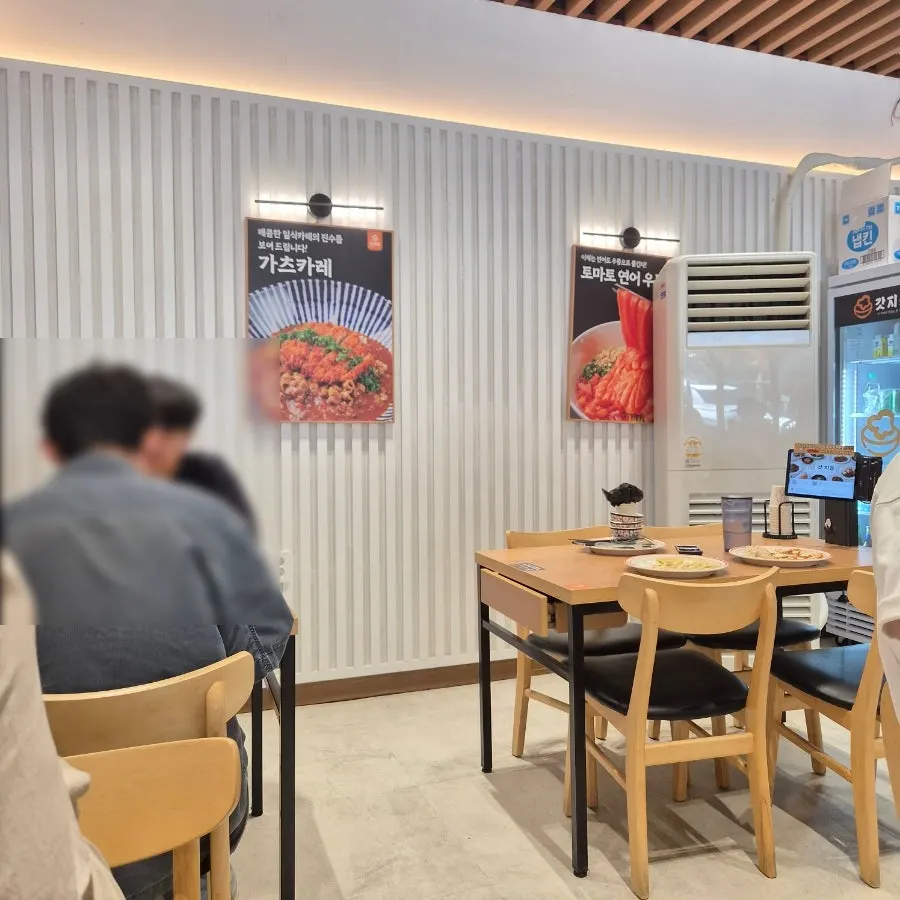 Interior of Gatjidong filled with lunchtime customers