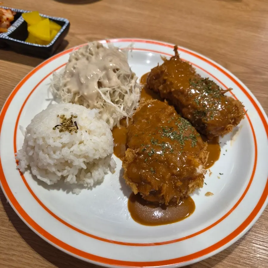 Piece of loin cutlet coated in creamy sauce