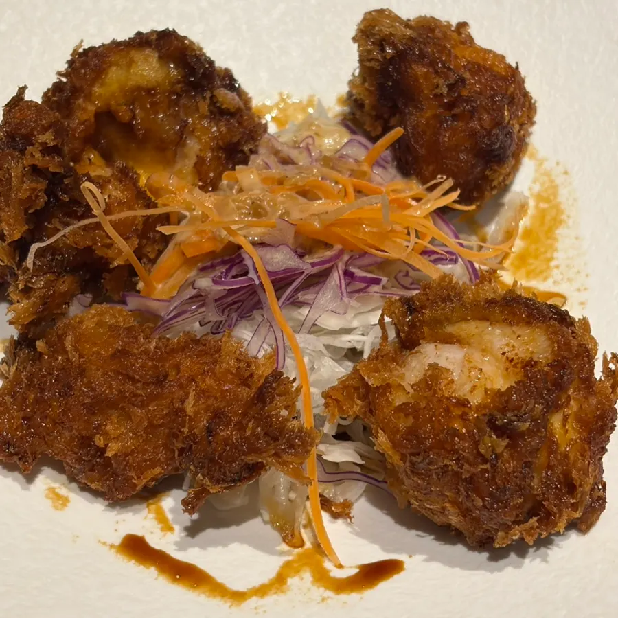 Close-up of the karaage served with salad
