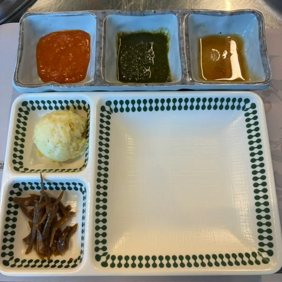 Labeled handmade ssamjang, basil ssamjang, and sesame oil sauce side dishes