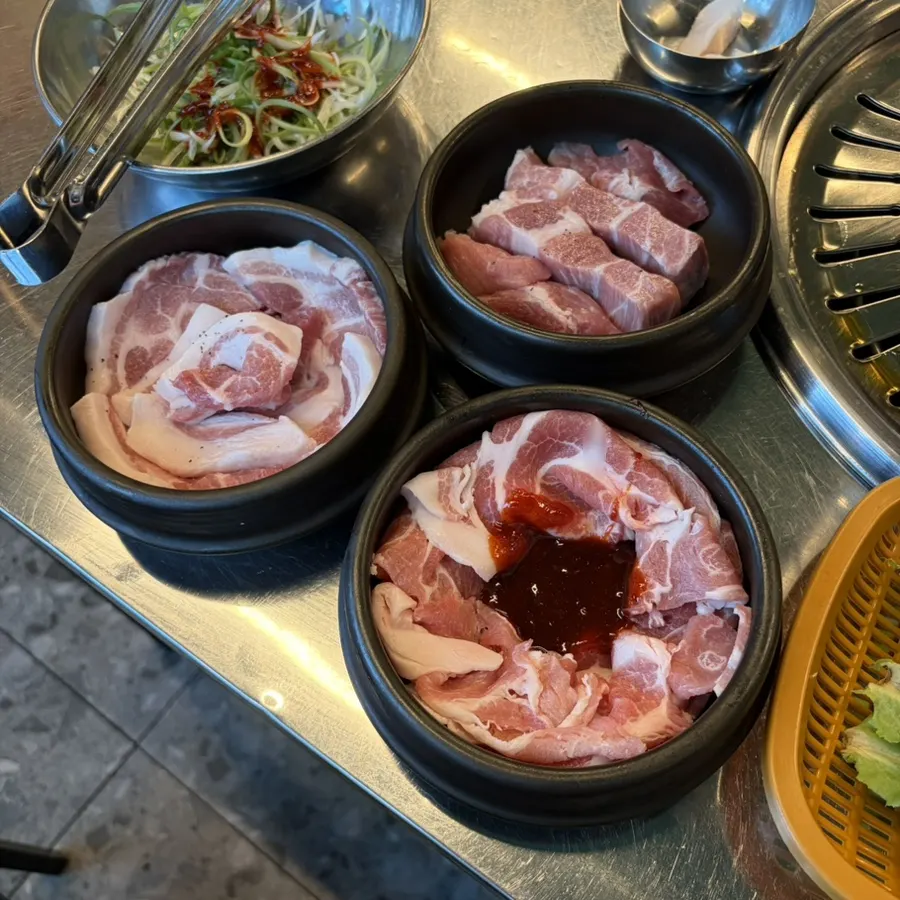 Meat served in a three-section pot