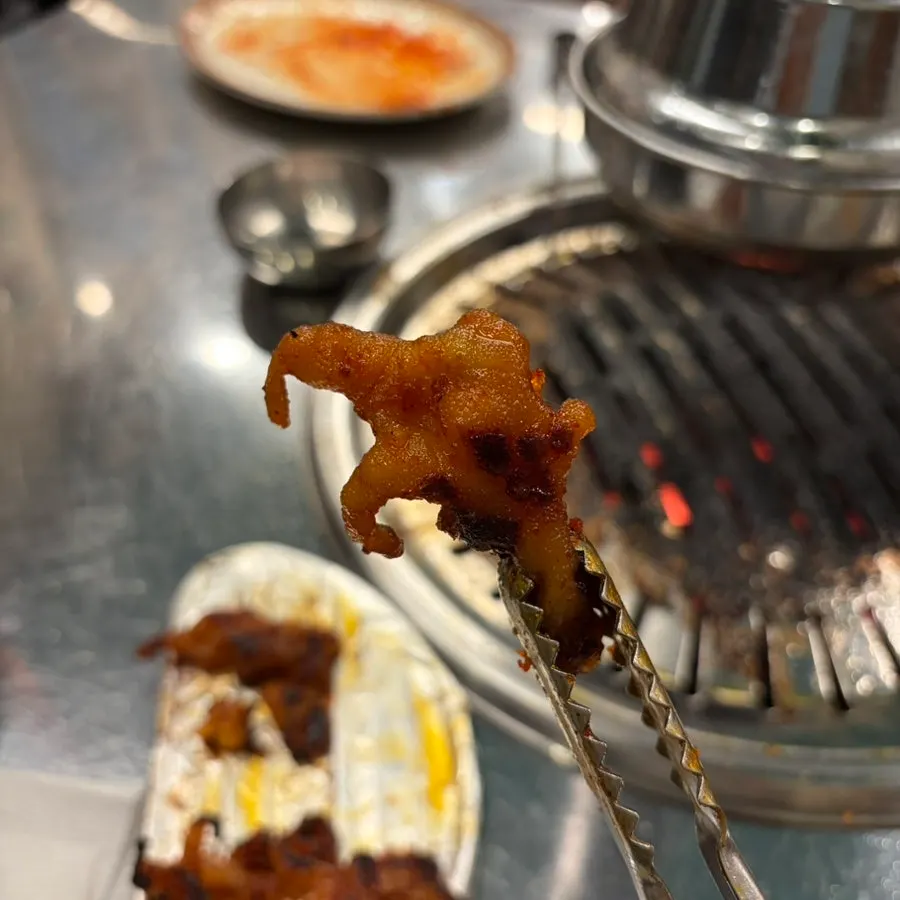Chicken feet coated in spicy sauce