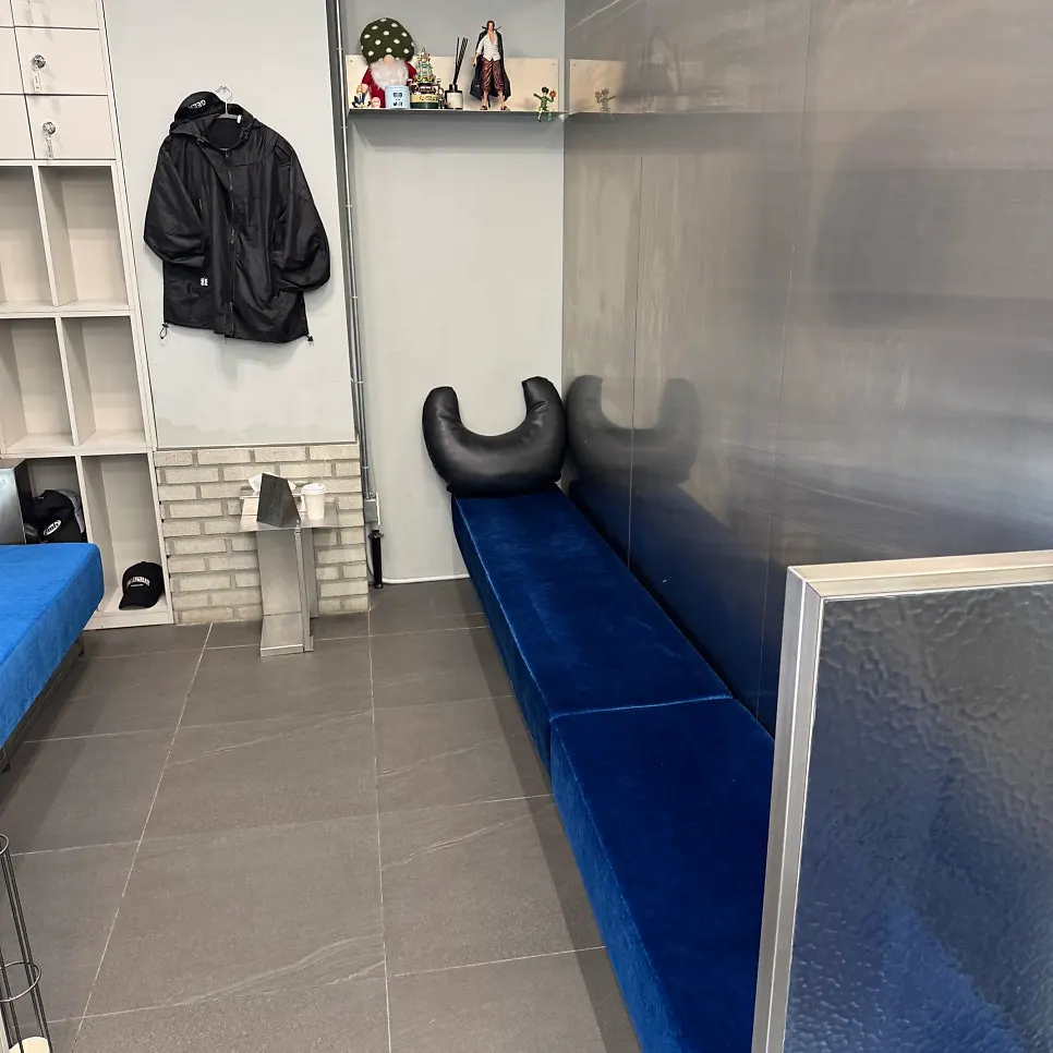 Long bench waiting area with a neck pillow
